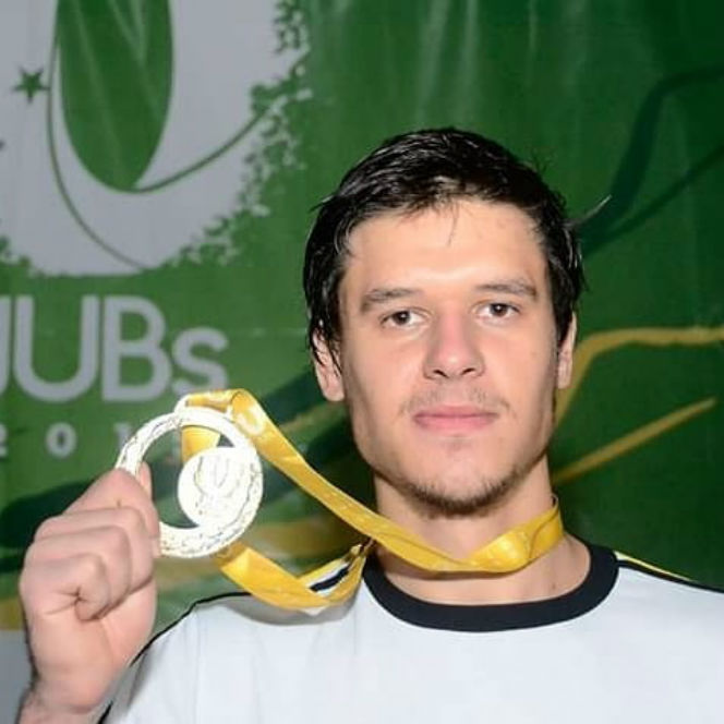 Lucas com a medalha de ouro  durante o JUBS 2019. Classificado para a UNIVERSIADE.